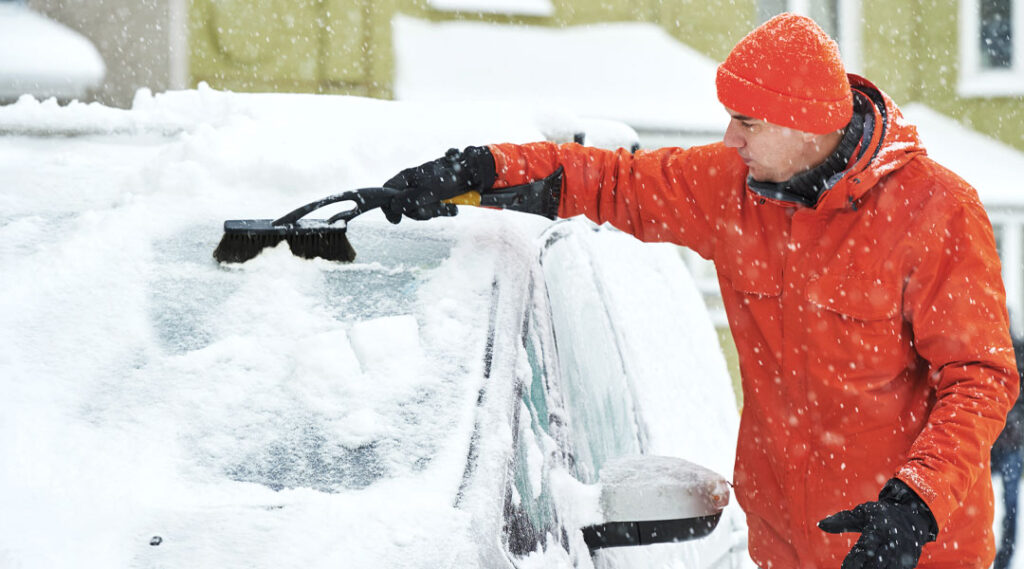 Usage du gratte glace en temps de neige