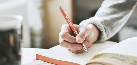 stylo avec logo sur carnet
