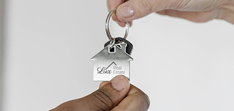 Porte-clé personnalisé en forme de maison pour agence immobilière