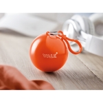 Poncho imperméable publicitaire plié dans une boule ronde Torrent couleur orange deuxième vue d'ambiance principale