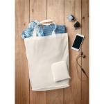 Sac pliant publicitaire en coton 100 g/m2 personnalisé EcoPocket couleur blanc vue d'ambiance