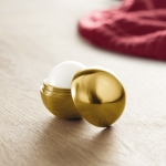 Baume à lèvres avec logo dans boîte ovale colorée SPF 15 UV Lipball couleur doré vue d'ambiance