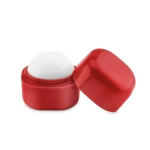 Boule de baume à lèvres publicitaire dans une boîte FPS 15 LipCube couleur rouge