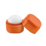 Boule de baume à lèvres publicitaire dans une boîte FPS 15 LipCube couleur orange