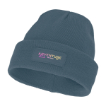 Bonnet publicitaire avec étiquette personnalisée Gorro Elevate™ Boreas couleur cyan