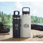 Gourde en inox avec fonction thermique grande 970 ml Handle couleur blanc vue d'ambiance principale