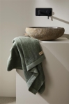 Serviette publicitaire en coton et lyocell 70x140cm FreshFiber Medium couleur vert vue d'ambiance