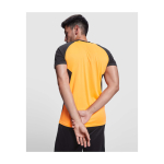 T-shirt de sport pour enfant bicolore 140 g/m² Roly Bugatti couleur orange image nature morte
