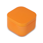 Bougie en cire végétale avec parfum vanille dans un pot en métal carré couleur orange