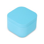 Bougie en cire végétale avec parfum vanille dans un pot en métal carré couleur bleu ciel