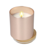Bougie en cire végétale dans un pot en aluminium recyclé métallisé couleur or rose deuxième vue