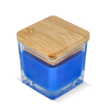 Bougie en cire végétale dans un pot en verre avec couvercle en bambou couleur bleu