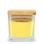 Bougie en cire végétale dans un pot en verre avec couvercle en bambou couleur jaune quatrière vue