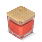 Bougie en cire végétale dans un pot en verre avec couvercle en bambou couleur orange