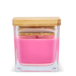 Bougie en cire végétale dans un pot en verre avec couvercle en bambou couleur rose quatrière vue