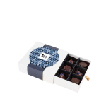 Coffret de 9 bonbons chocolat au lait fourrés au café ou prunes vue principale