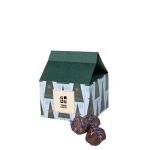 Petite maison de Noël avec bonbons de prunes enrobées de chocolat vue principale