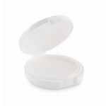 Baume à lèvres vegan avec SPF10, arôme vanille, dans un étui rond couleur blanc