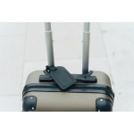 Étiquette de suivi pour bagage avec Find My de Apple couleur noir vue d'ambiance