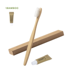 Brosse à dents en bambou et dentifrice dans une boîte en carton