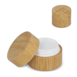 Baume à lèvres dans un étui en bambou de forme cylindrique