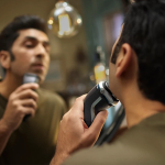 Rasoir électrique pour la tête et le visage marque Philips couleur noir