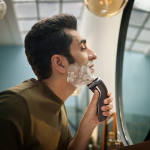 Rasoir électrique pour la tête et le visage marque Philips couleur noir