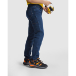 Pantalon de travail en coton et polyester 370 g/m² Roly Raptor couleur bleu jean troisième vue d'usage