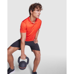 Polo technique en polyester recyclé 125 g/m² Roly Direct Tormo couleur orange foncé première vue d'usage