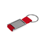 Porte-clés métallique avec sangle textile au design contemporain couleur rouge