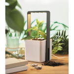 Pot de fleurs d'intérieur avec 4 lumières LED sur le dessus couleur blanc vue d'ambiance
