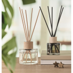 Diffuseur de parfum en verre avec 6 bâtonnets à la vanille couleur transparent vue d'ambiance
