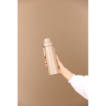 Gourde isotherme en acier recyclé avec anse et double ouverture 600 ml couleur ivoire vue d'ambiance