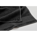 Serviette de bain 100 % coton éponge 380 g/m² 70x140 cm couleur noir cinquième vue photographique