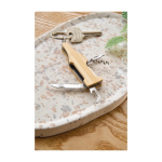 Porte-clés bouteille multi-usages avec tire-bouchon et cutter neuvième vue