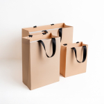 Sac en papier premium et mate avec anses en tissu résistantes 7 kg Vue 1