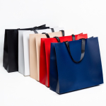 Sac en papier premium mat, soufflet et anses en tissu résistant 9 kg vue plusieurs couleurs