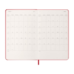 Agenda effet cuir, vue journalière et couverture rigide Moleskine couleur rouge foncé troisième vue