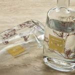 Bouteille en verre fabrication UE, bouchon argenté anti-fuite 700 ml couleur transparent vue d'ambiance