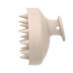 Brosse massante en plastique pour masser et exfolier le cuir chevelu couleur beige