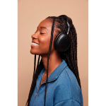 Casque supra-auriculaire pliable avec batterie amovible USB-C couleur noir vue d'ambiance 2
