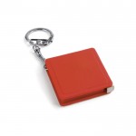 Porte-clé avec un mètre ruban de 1m couleur rouge