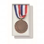 Médaille en fer avec ruban tricolore bleu, blanc, rouge couleur marron