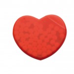 Bonbons promotionnels dans une boîte en forme de cœur couleur  rouge