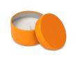 Bougie en cire végétale dans un pot en acier recyclé circulaire couleur orange