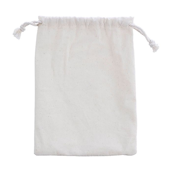 Sac en coton avec un set de 4 articles pour la salle de bain