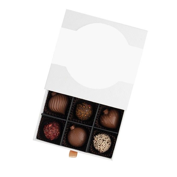 Coffret de pralinés en forme de boule de Noël ou décorés