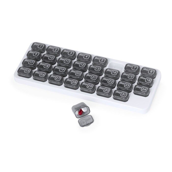 Pilulier mensuel en forme de clavier d'ordinateur à 31 cases