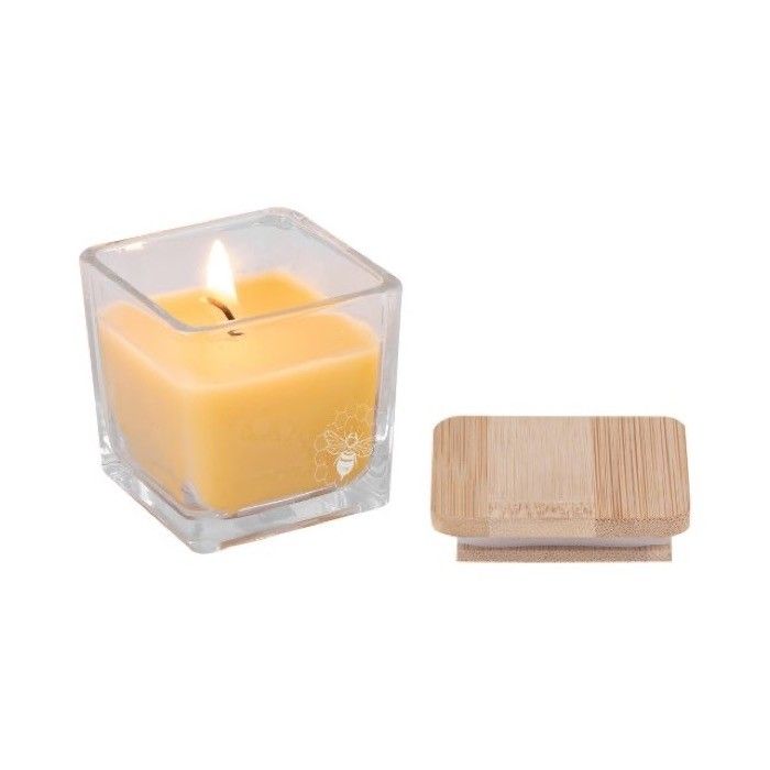 Bougie en cire d'abeille et végétale avec motif d'abeille sur le pot
