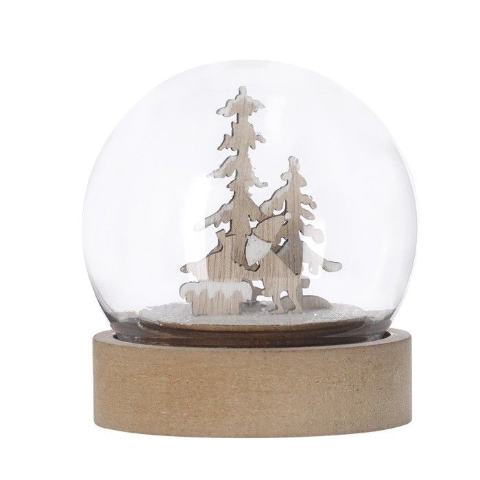 Boule lumineuse avec motif de Noël à l'intérieur et une base en bois
